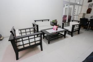 Posezení v ubytování Hotel O Sman House