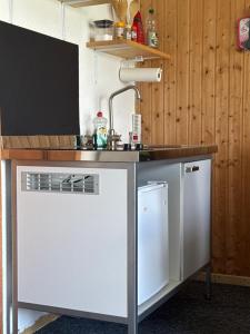 Kuchyň nebo kuchyňský kout v ubytování Ferienwohnung Sonnenseite Brienz