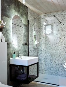 a bathroom with a sink and a mirror at Baltico Stodoła in Mielno +36 photos