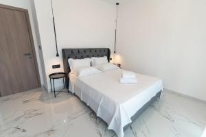 Ένα ή περισσότερα κρεβάτια σε δωμάτιο στο Casa Xanthenia