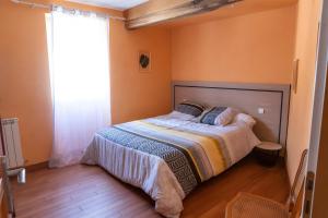 Cama o camas de una habitación en Gîte Ainerak
