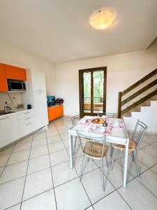 Kuchyň nebo kuchyňský kout v ubytování Pomposa Residence