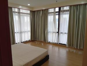Postel nebo postele na pokoji v ubytování Fantastic appartment at times square Kuala Lumpur