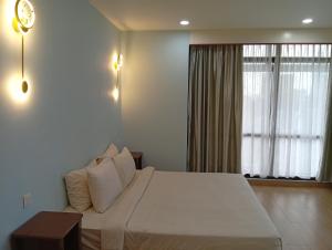 Postel nebo postele na pokoji v ubytování Fantastic appartment at times square Kuala Lumpur