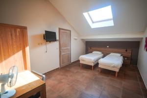 Postel nebo postele na pokoji v ubytování Residence Les Chataigniers