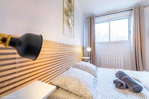 Postel nebo postele na pokoji v ubytování Le Tikehau 4pers, 10min Disneyland Paris + 23 fotografií