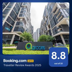 a picture of a building with a sign in front of it at Arcoris Mont Kiara in Kuala Lumpur