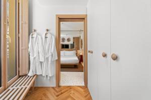 Postel nebo postele na pokoji v ubytování Hotel Milu Milano