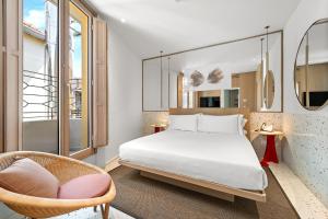 Postel nebo postele na pokoji v ubytování Hotel Milu Milano