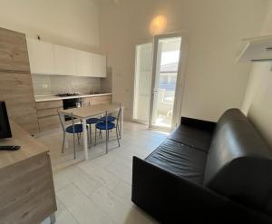 Kuchyň nebo kuchyňský kout v ubytování Pomposa Residence