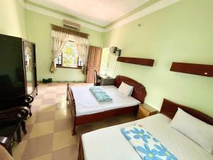 Μια τηλεόραση ή/και κέντρο ψυχαγωγίας στο OYO 1297 Hotel Hung Lam