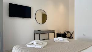 Ліжко або ліжка в номері Palma Village by Greek Pride Hotels