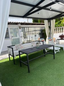 Tenis stołowy w obiekcie Apartamento 2, Chalet Manzano a 15" de Sevilla, a 30" del Aeropuerto de Sevilla lub pobliżu