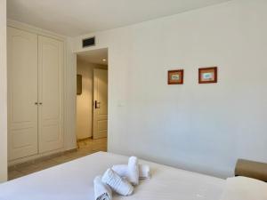 Posteľ alebo postele v izbe v ubytovaní Apartamentos APOLO16 (I-15º-70)
