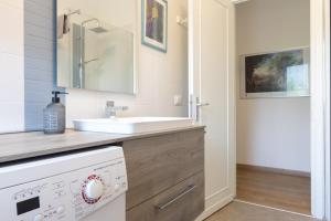 Koupelna v ubytování appartamento centralissimo vista terme