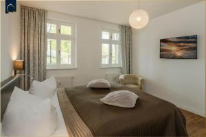 Ένα ή περισσότερα κρεβάτια σε δωμάτιο στο Hohe Buchen Apartment 2