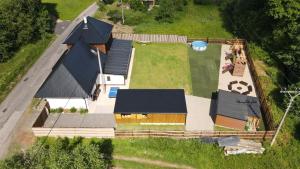 an overhead view of a house with a roof at Chalupa Herbortice in Cotkytle +68 photos
