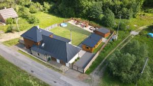 an aerial view of a house with a yard at Chalupa Herbortice in Cotkytle