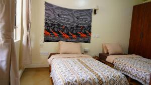 Postel nebo postele na pokoji v ubytování ZZZ hostel Nairobi