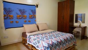 Postel nebo postele na pokoji v ubytování ZZZ hostel Nairobi
