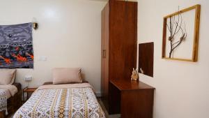 Postel nebo postele na pokoji v ubytování ZZZ hostel Nairobi