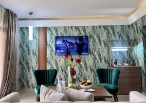 TV a/nebo společenská místnost v ubytování Hotel Prestige Agadir Boutique & SPA