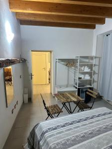 Postel nebo postele na pokoji v ubytování Relais corso Vittorio 25