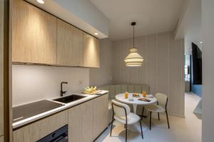 Cucina o angolo cottura di Ambasciatori Suite Hotel