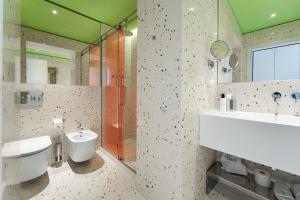 Koupelna v ubytování Hotel Milu Milano