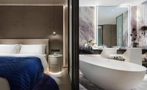 Voodi või voodid majutusasutuse Vance Hotel - Alibaba Xixi C District toas