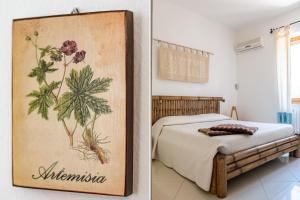 A bed or beds in a room at B&B Artemisia