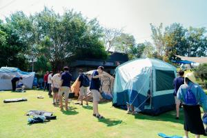 a group of people standing around a tent at Greenfield Farmstay Vung Tau in Ba Ria +103 photos