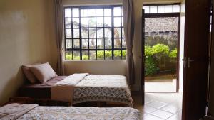 Postel nebo postele na pokoji v ubytování ZZZ hostel Nairobi