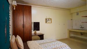 TV a/nebo společenská místnost v ubytování ZZZ hostel Nairobi