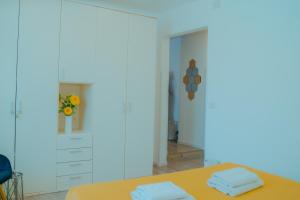 Posteľ alebo postele v izbe v ubytovaní Casa Sorriso