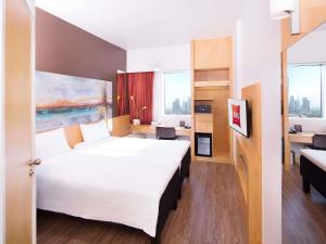 Voodi või voodid majutusasutuse Ibis One Central - World Trade Centre Dubai toas