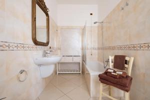 Koupelna v ubytování B&B Artemisia + 37 fotografií