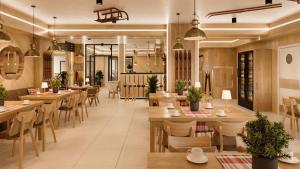 Reštaurácia alebo iné gastronomické zariadenie v ubytovaní Hotel Jaworzyna Krynicka