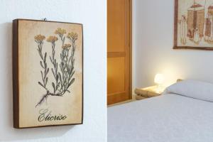 A bed or beds in a room at B&B Artemisia