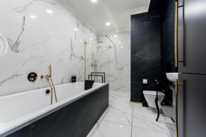 Kúpeľňa v ubytovaní Luxury penthouse with jacuzzi + 16 fotografií