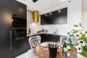 Kuchyňa alebo kuchynka v ubytovaní Luxury penthouse with jacuzzi