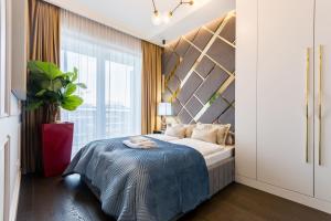Posteľ alebo postele v izbe v ubytovaní Luxury penthouse with jacuzzi