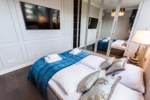 Posteľ alebo postele v izbe v ubytovaní Luxury penthouse with jacuzzi