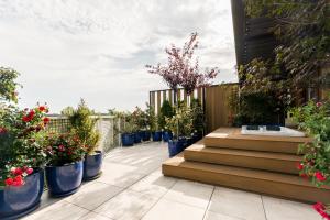 Vonkajšia záhrada v ubytovaní Luxury penthouse with jacuzzi