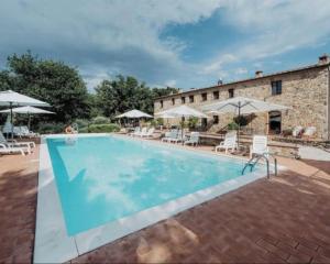 Bazén v ubytování Una Stanza con vista tra le colline senesi - Friland nebo v jeho okolí