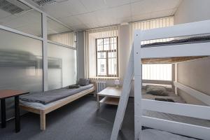 Postel nebo postele na pokoji v ubytování Vilnius Hostel