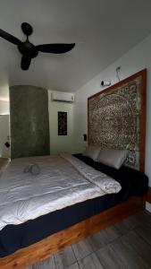 Postel nebo postele na pokoji v ubytování Samui Hills Resort