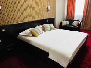 Voodi või voodid majutusasutuse Nowad Hotel toas
