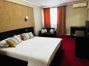 Voodi või voodid majutusasutuse Nowad Hotel toas