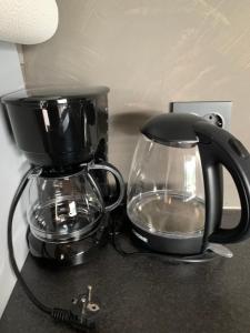 a coffee maker and a blender on a counter at Stryn Golden Resort - Panorama II in Stryn